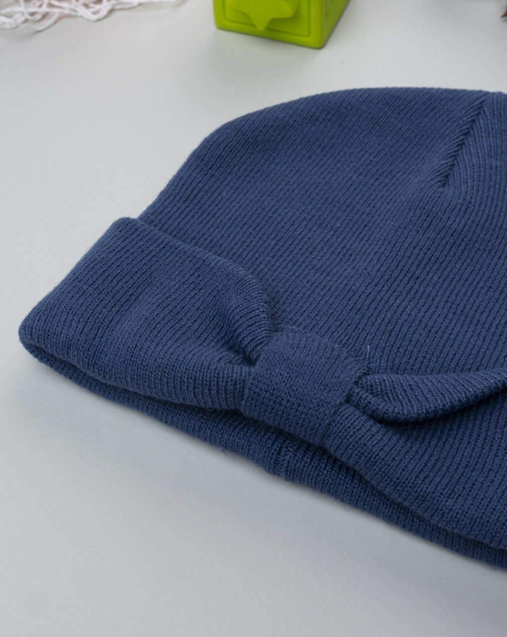 Berretto blu bambina con fiocco