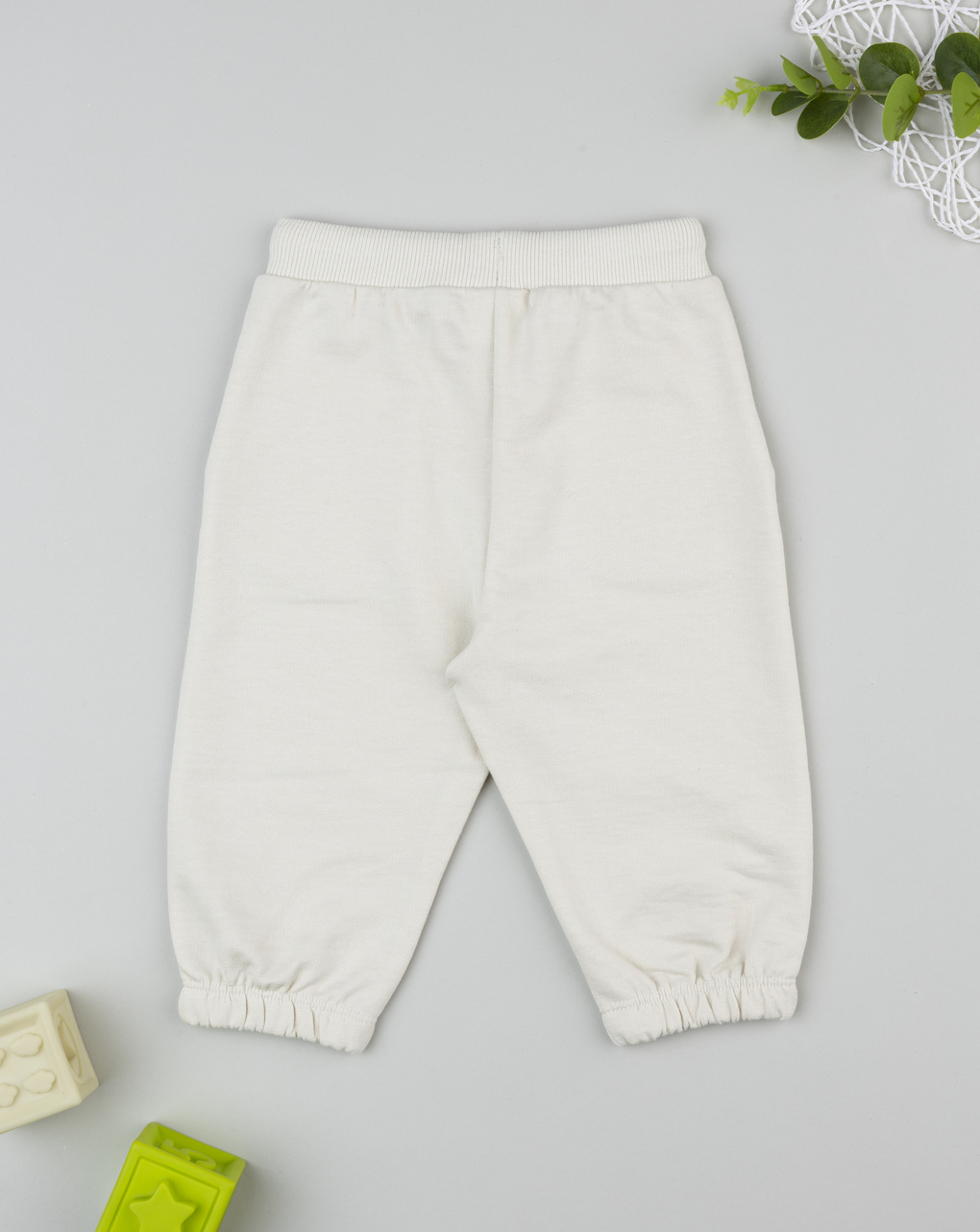 Pantalone bimbo beige stampa rilievo