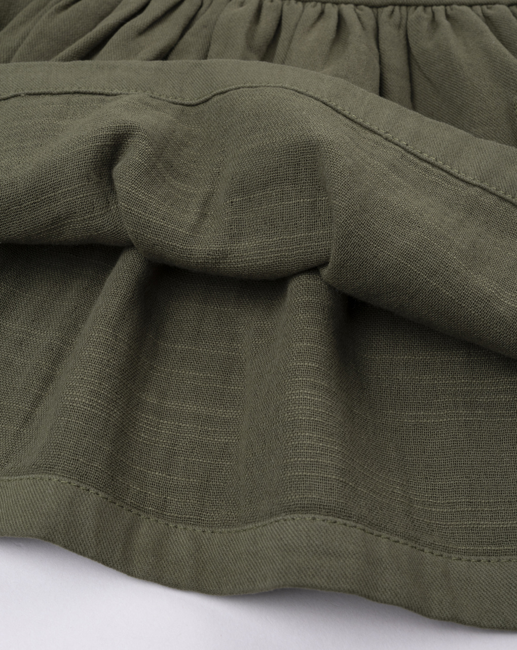 Abito salopette bimba verde con ricami