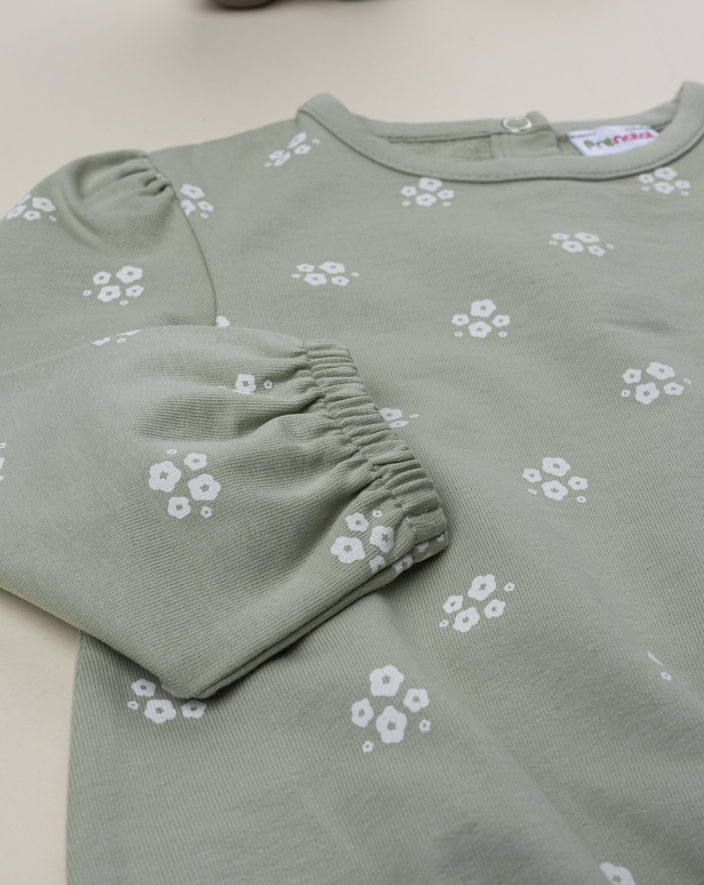 Felpa bimba verde stampa fiori bianchi