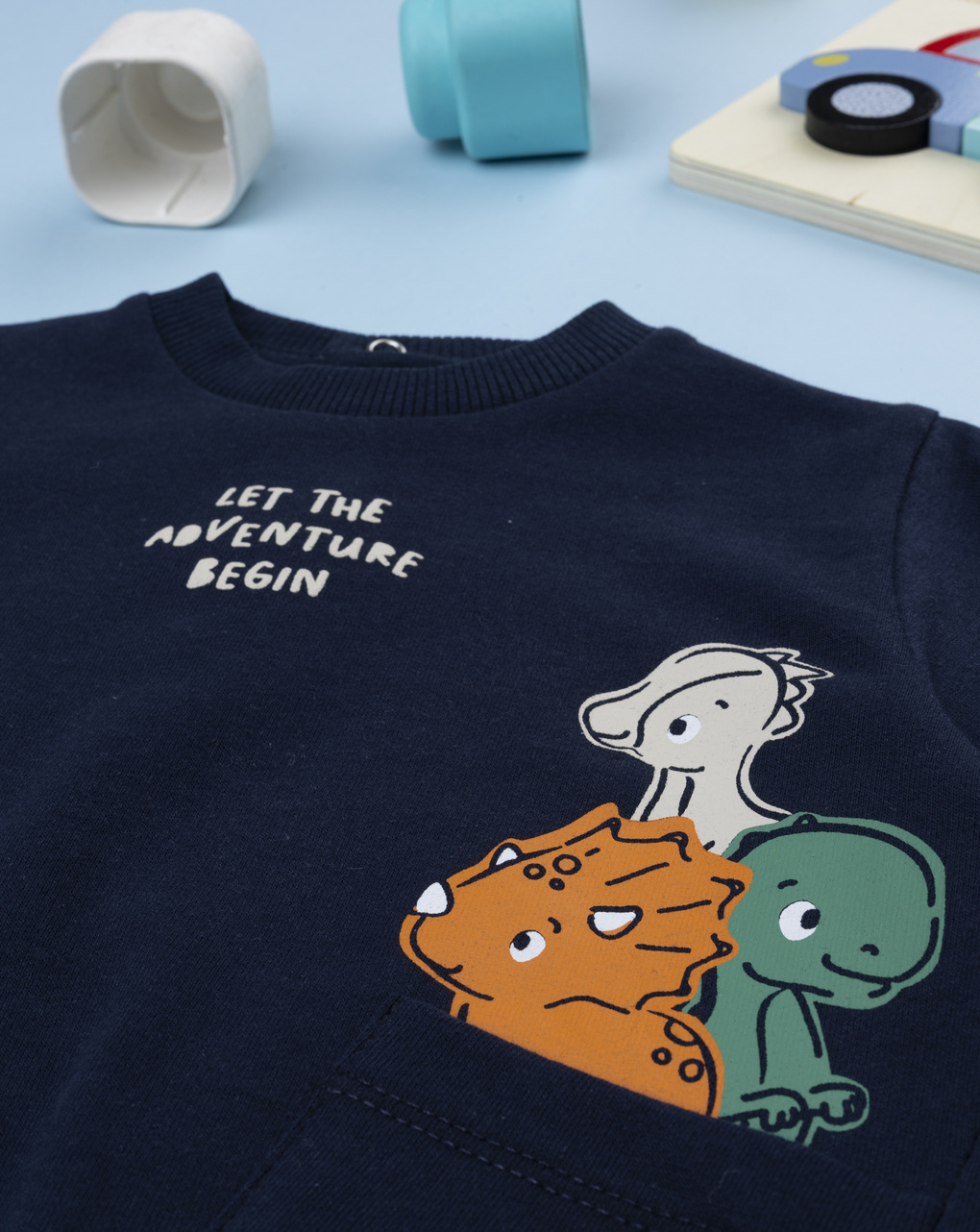 Maglia bimbo blu stampata dinosauri