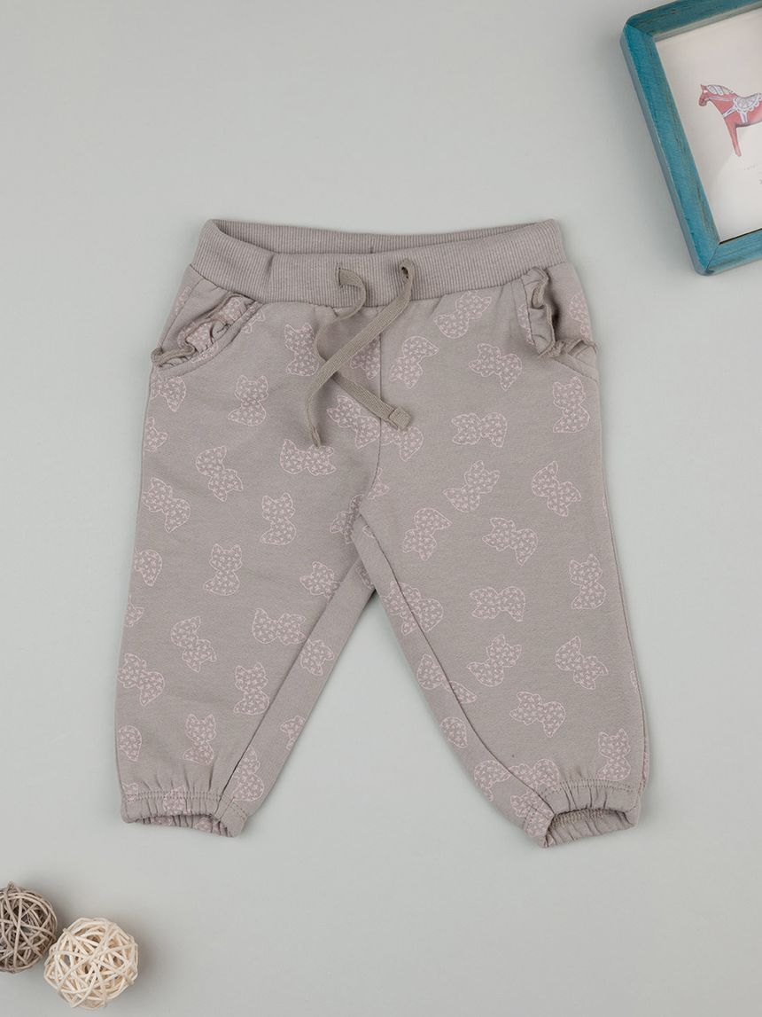 Pantaloni beige bimba con allover e ruches