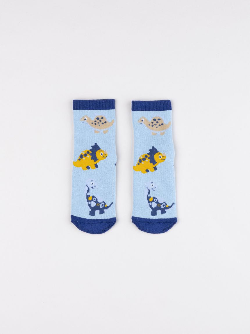Calze antiscivolo bimbo azzurre con dinosauri