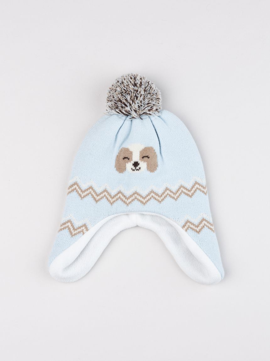 Peruviano bimbo azzurro cagnolino con pon pon