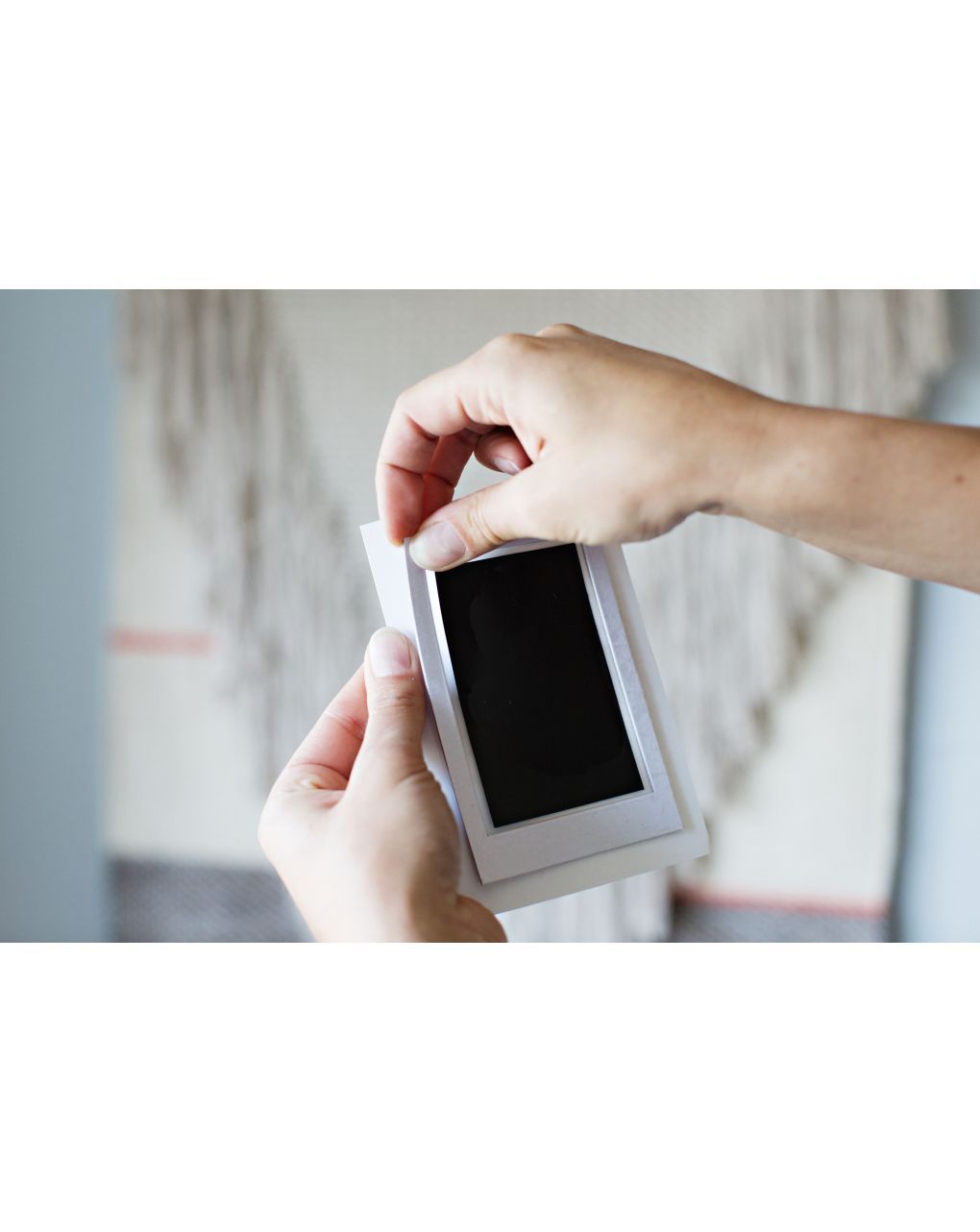 Cornice da parete bianca