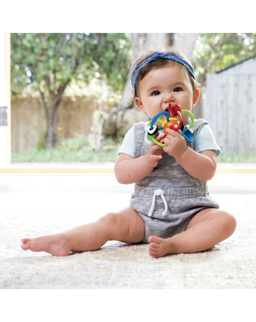 Infantino – sonaglio e massaggiagengive colorato