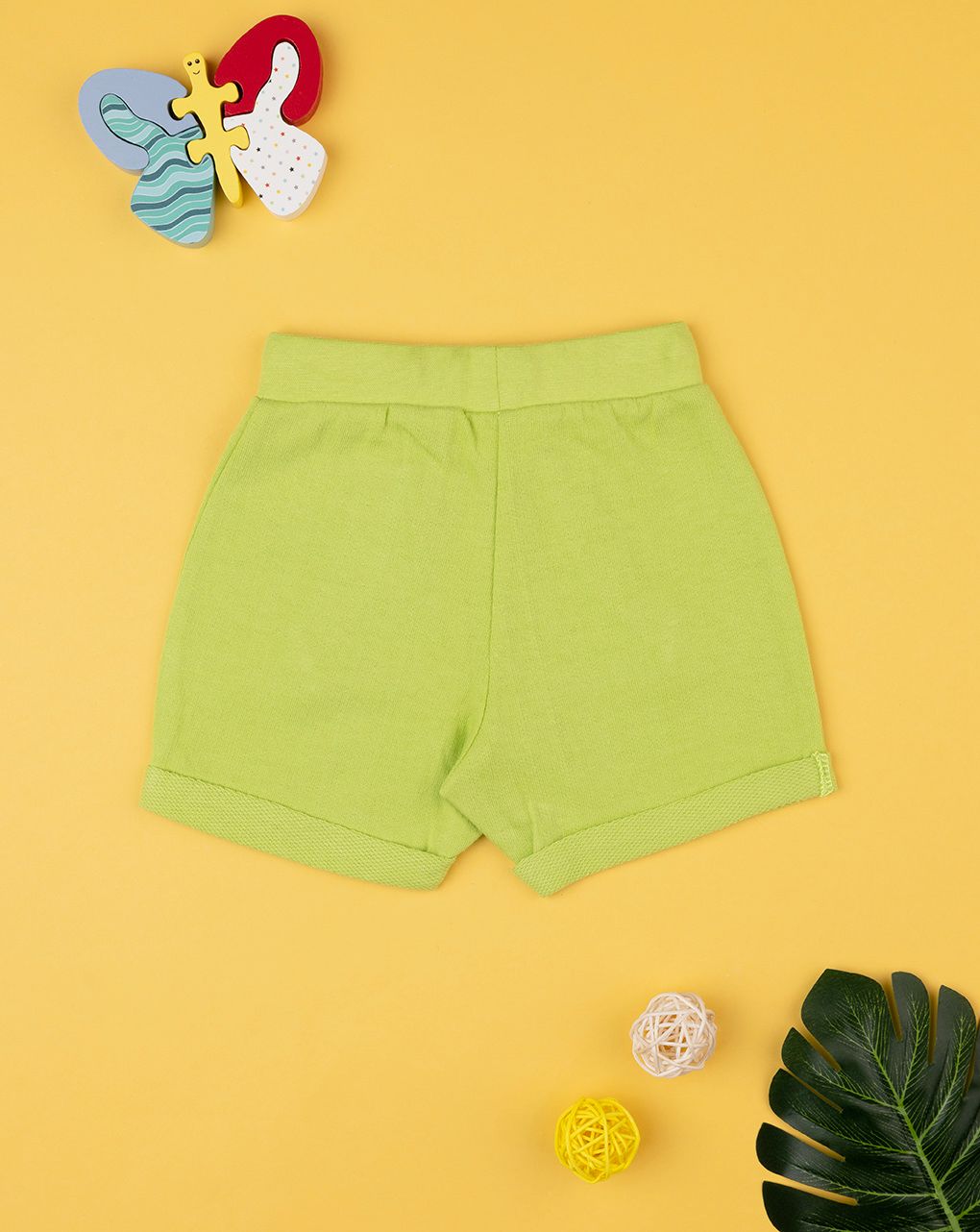 Bermuda bimbo verdi in felpina con tasca