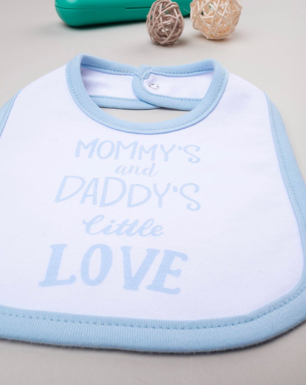 Bavaglino azzurro con stampa