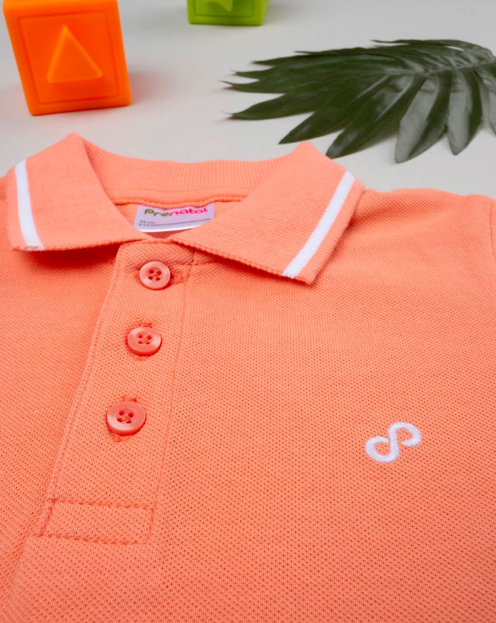 Polo bimbo arancione