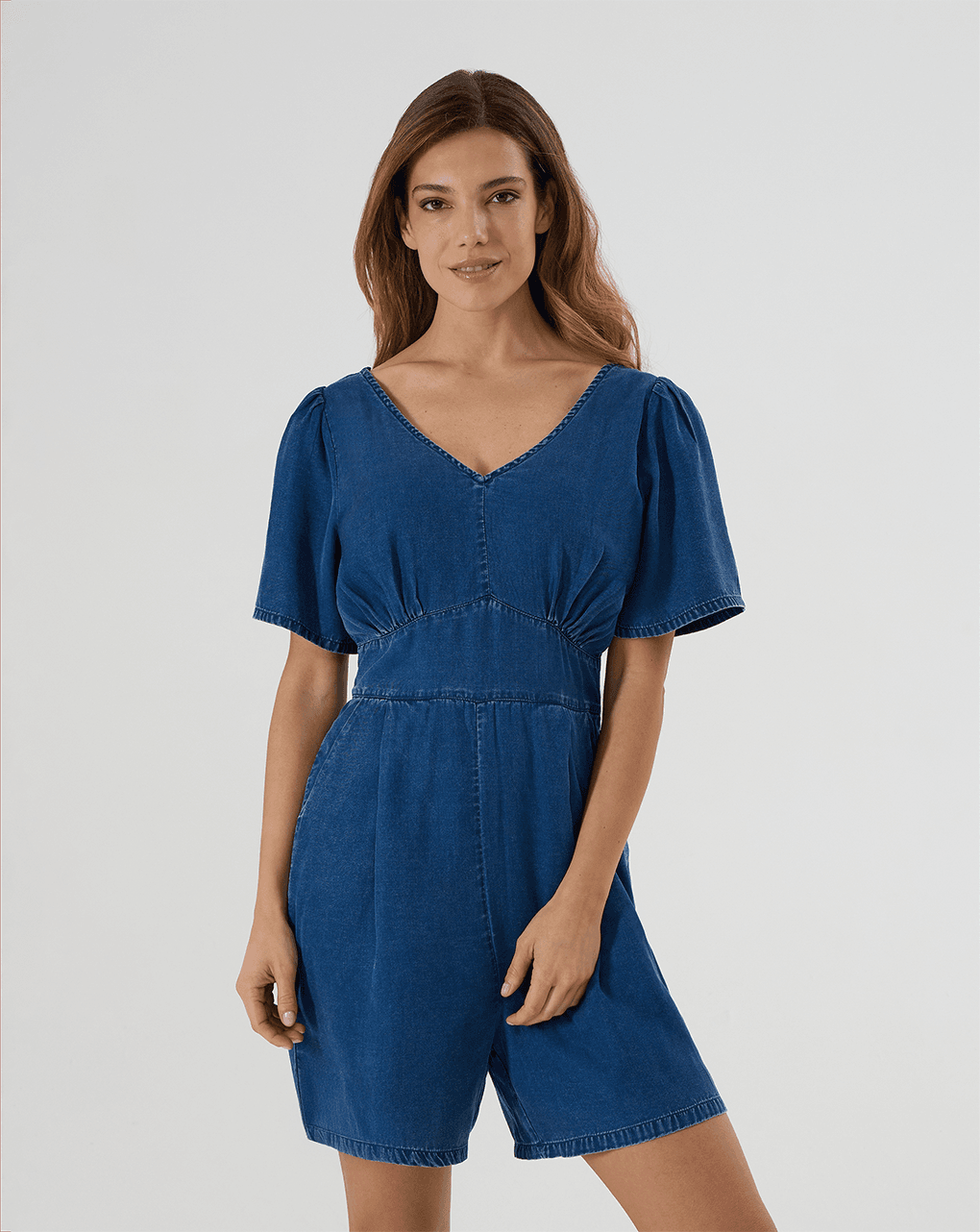 Tuta corta in denim con punto smock