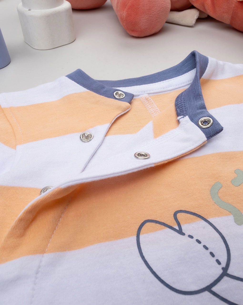 Tutina bimbo righe arancioni con stampa