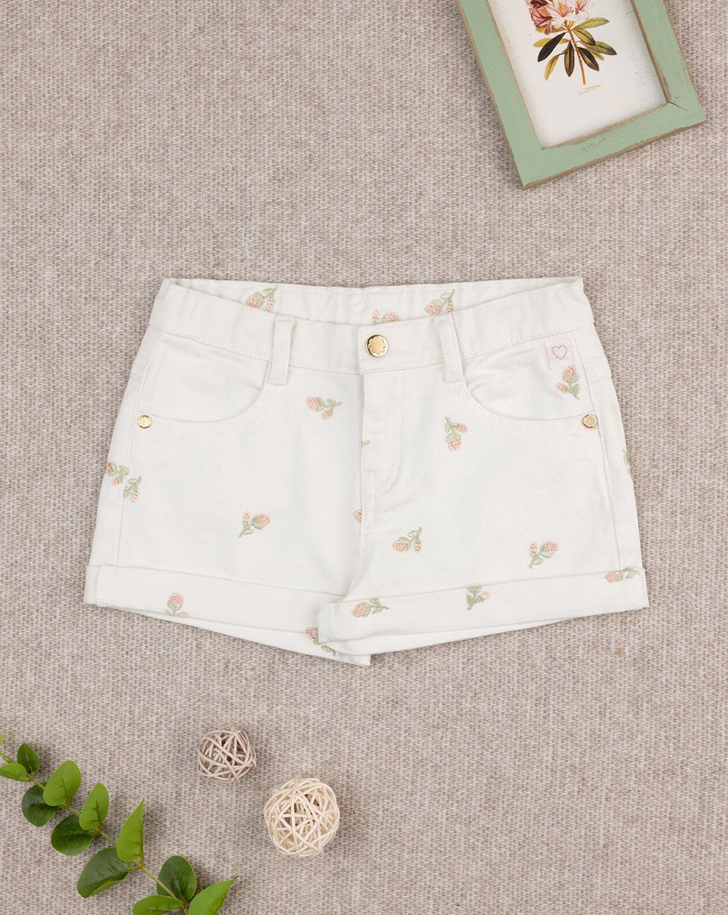 Shorts bimba panna con tulipani