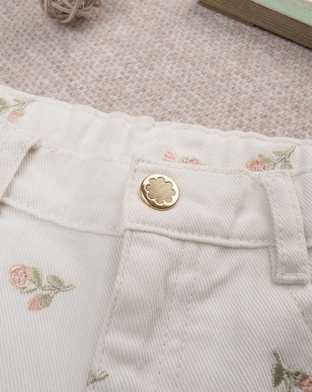 Shorts bimba panna con tulipani