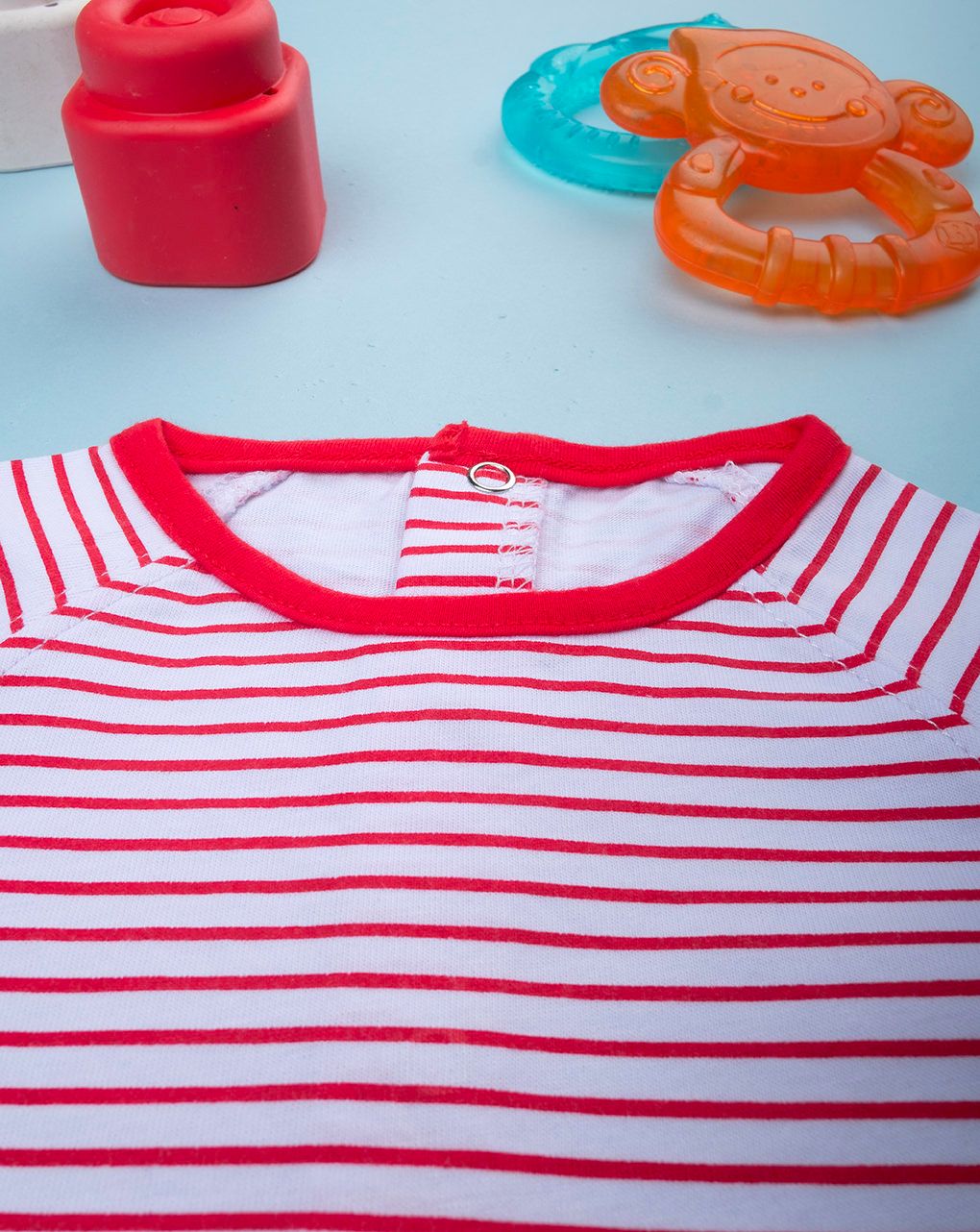 Pagliaccetto neonato righine rosse