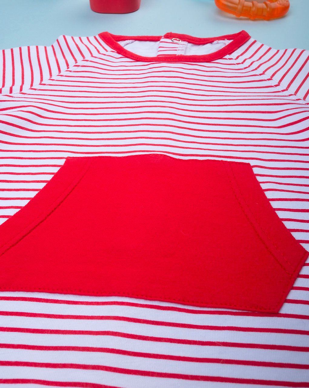 Pagliaccetto neonato righine rosse