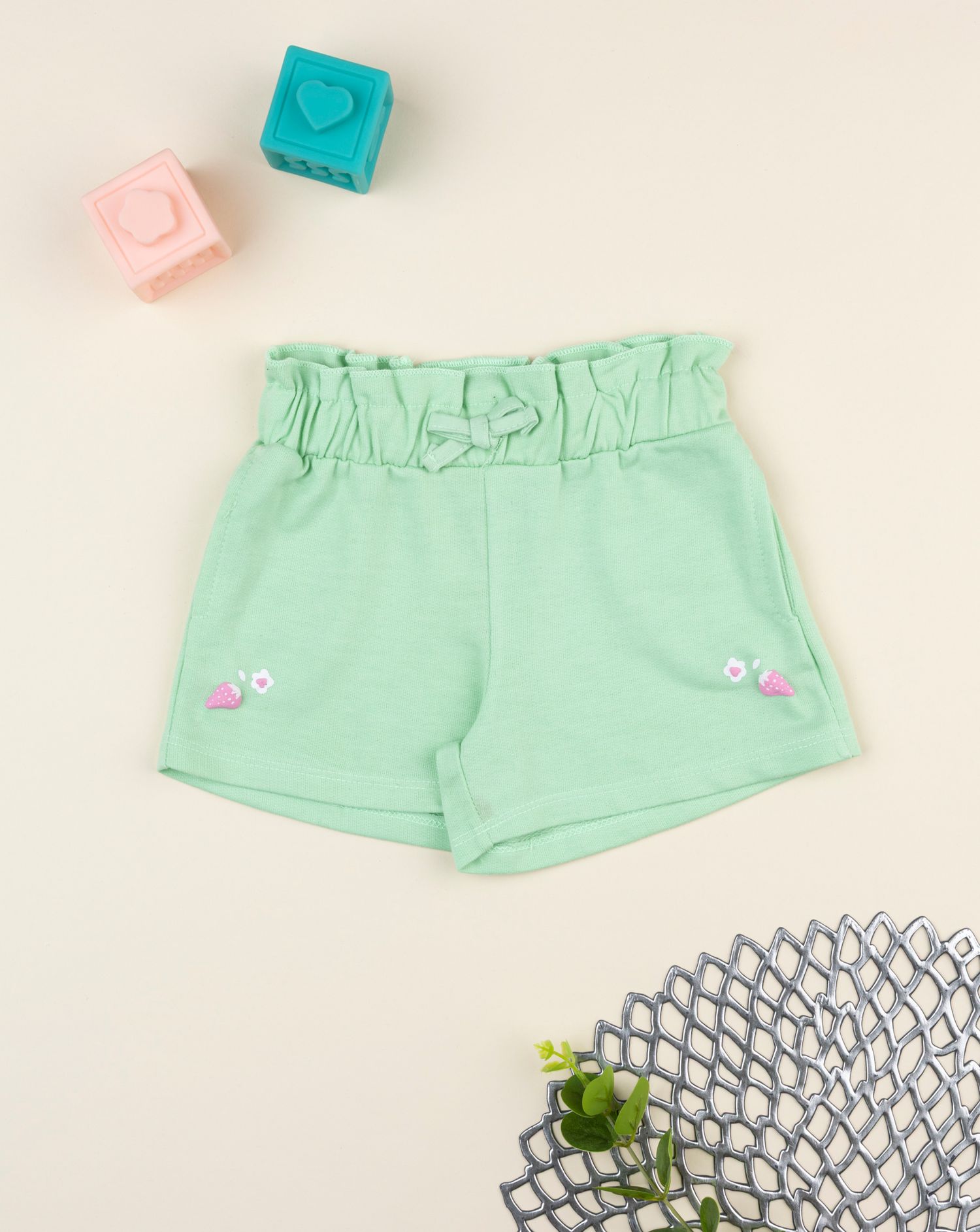 Shorts bimba verde con stampa