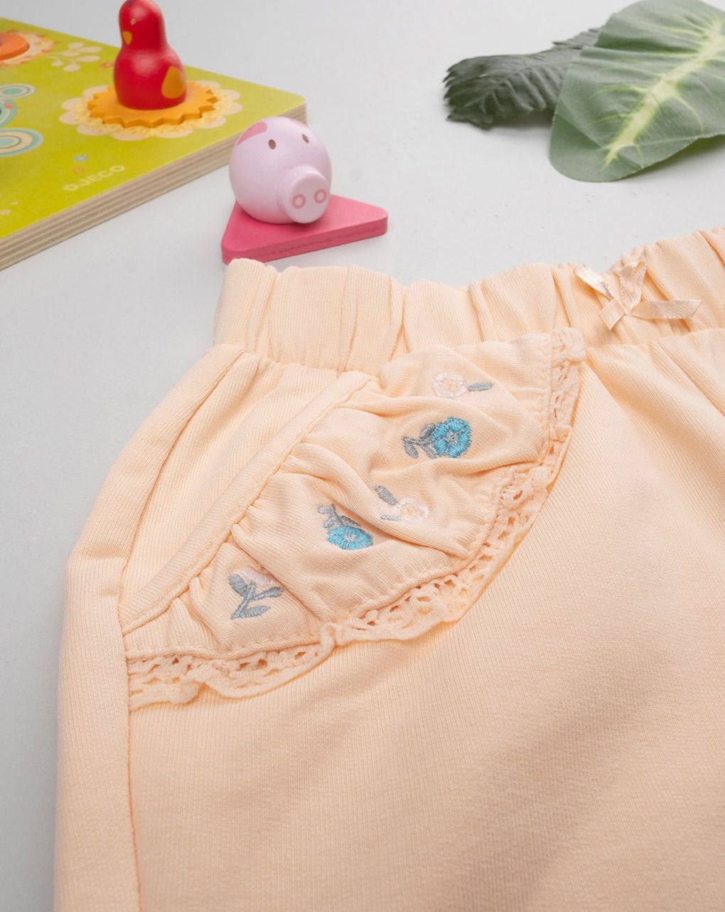 Pantalone bimba arancione con ricami