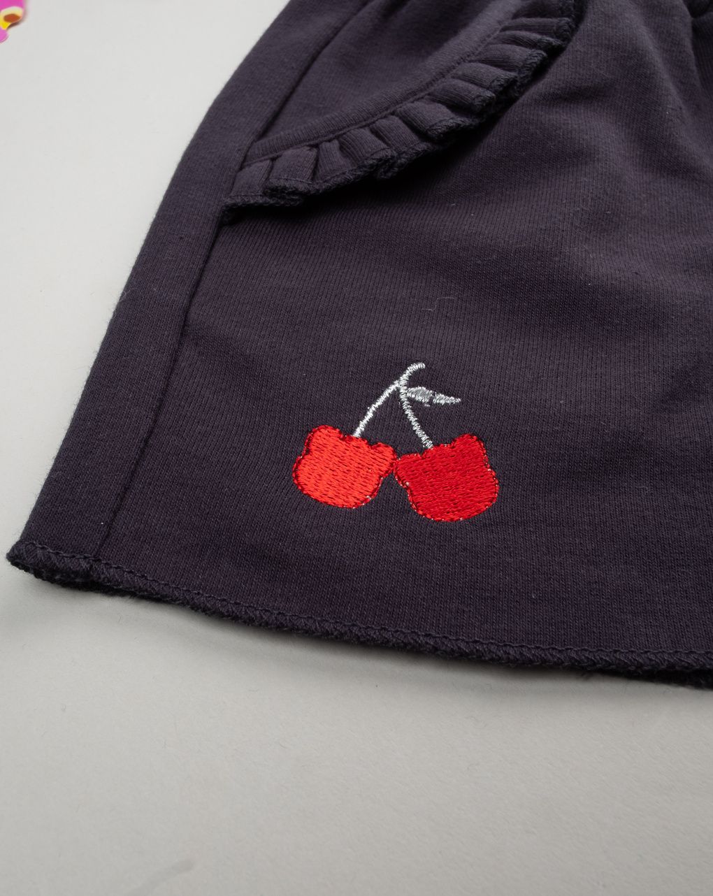 Shorts bimba neri ricami frutta