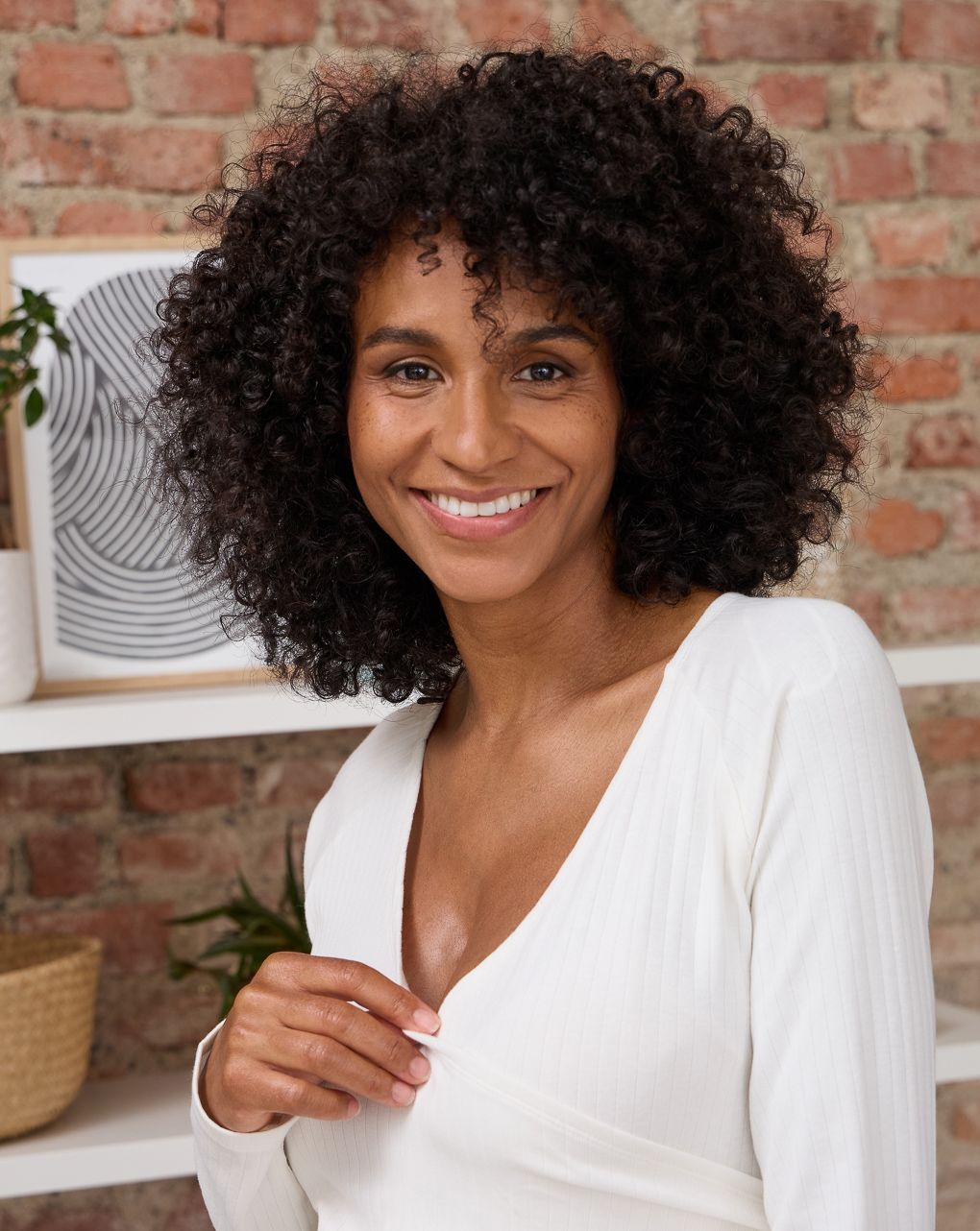 Maglioncino premaman bianco con scollo a v