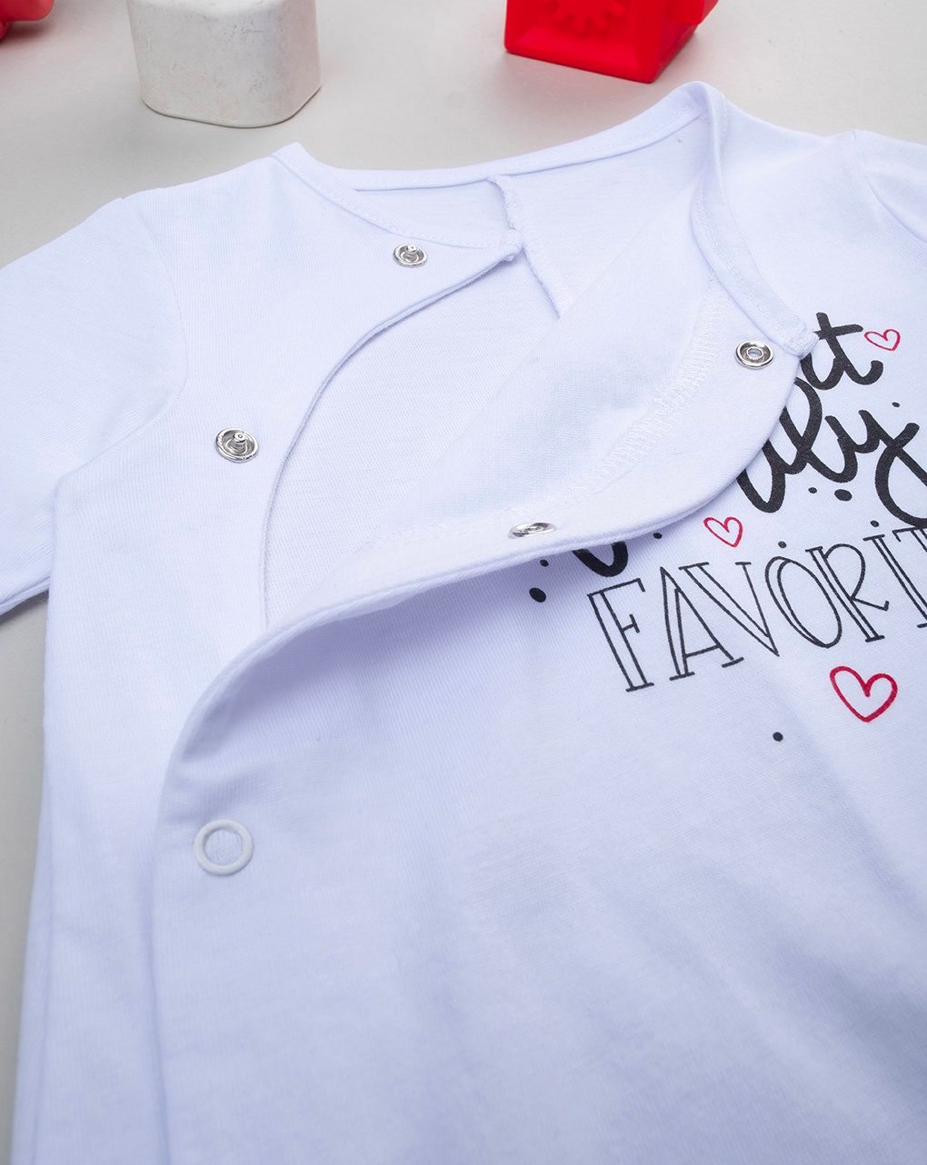 Tutina unisex bianca con stampa