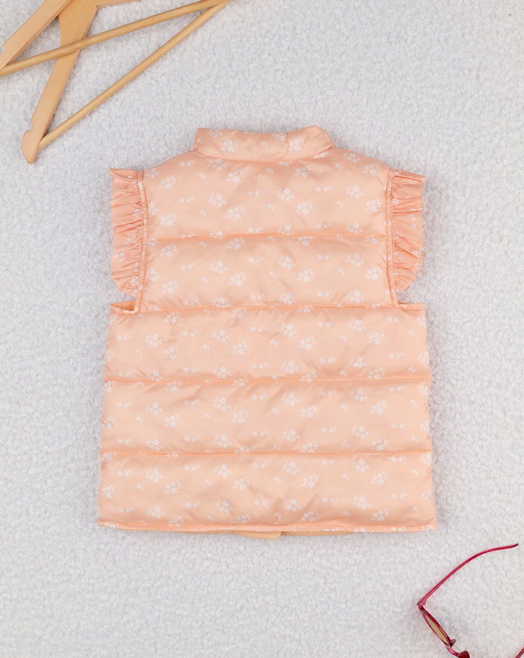 Piumino smanicato bimba arancione