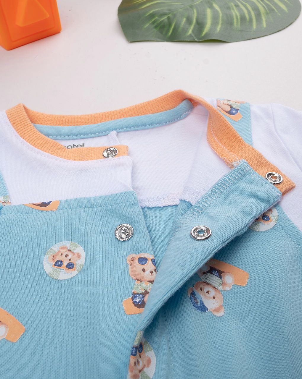 Pagliaccetto bimbo azzurro/bianco con stampa allover