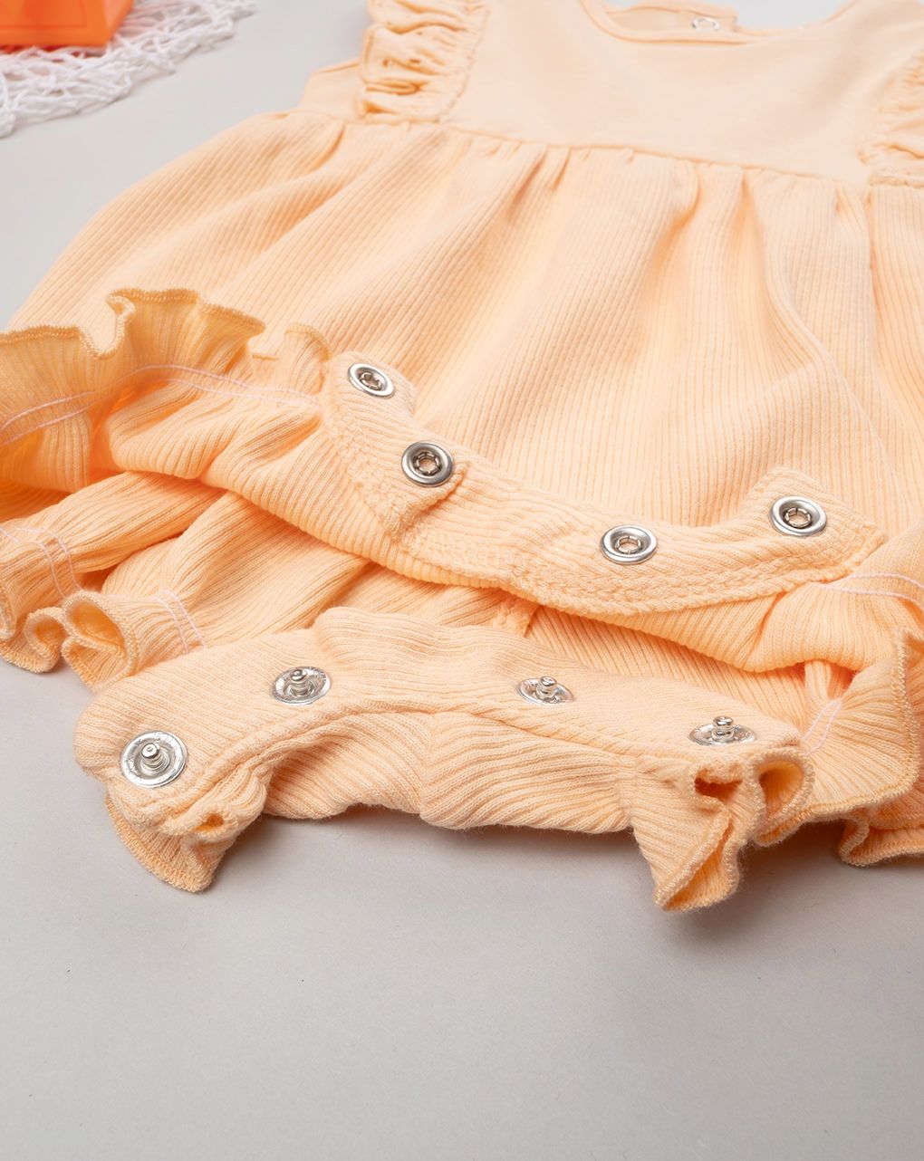 Pagliaccetto bimba arancione frill