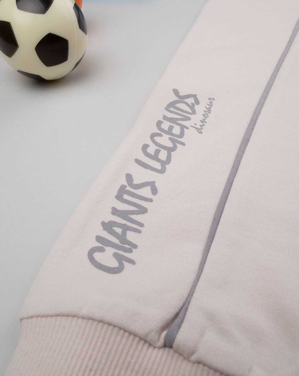 Pantaloni bambino beige dinosauri