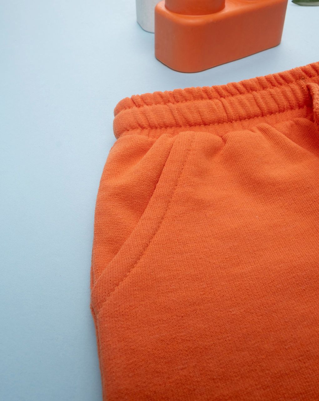 Shorts bimbo arancioni