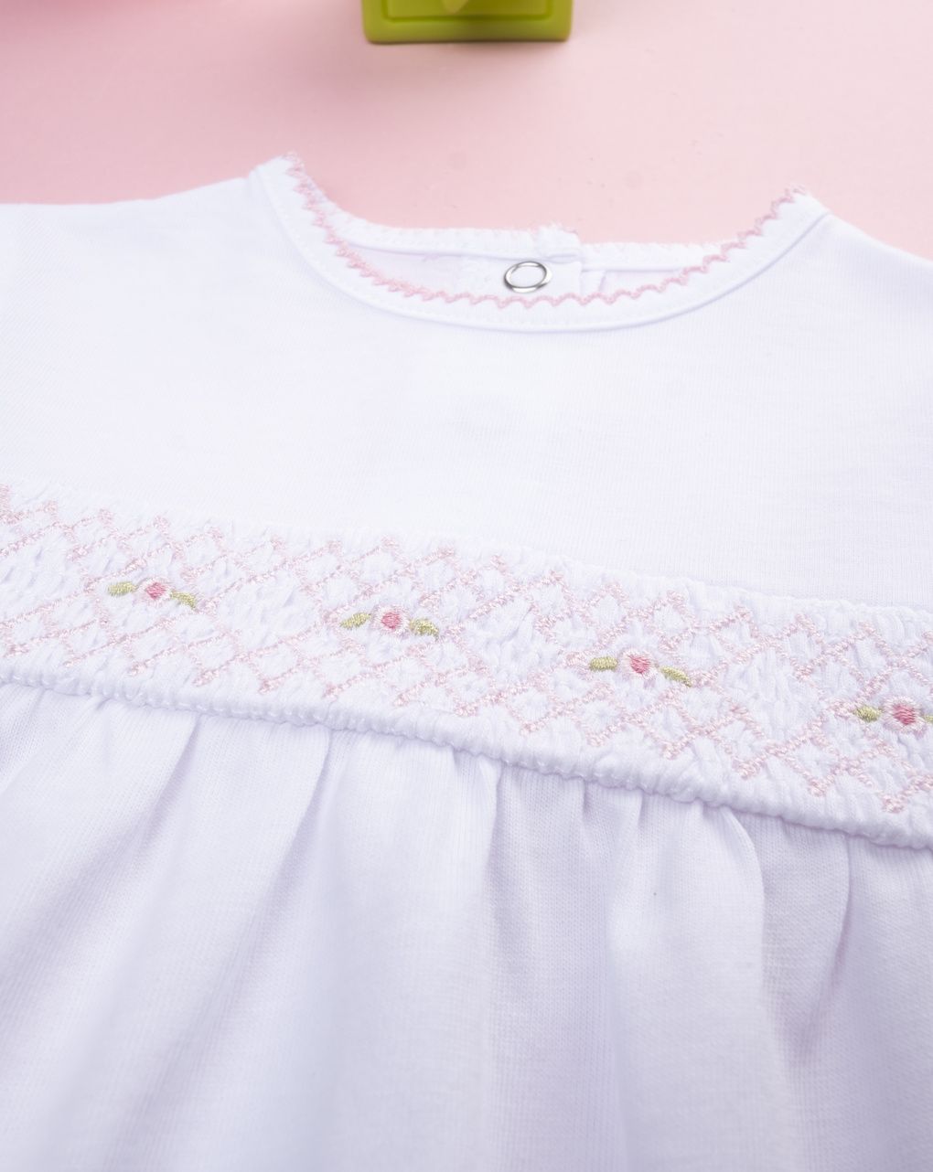 Pagliaccetto bimba bianco con greca