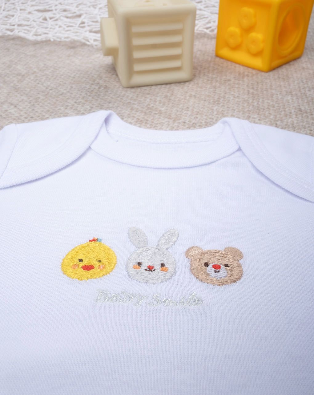 Body unisex bianco ricamo baby smile