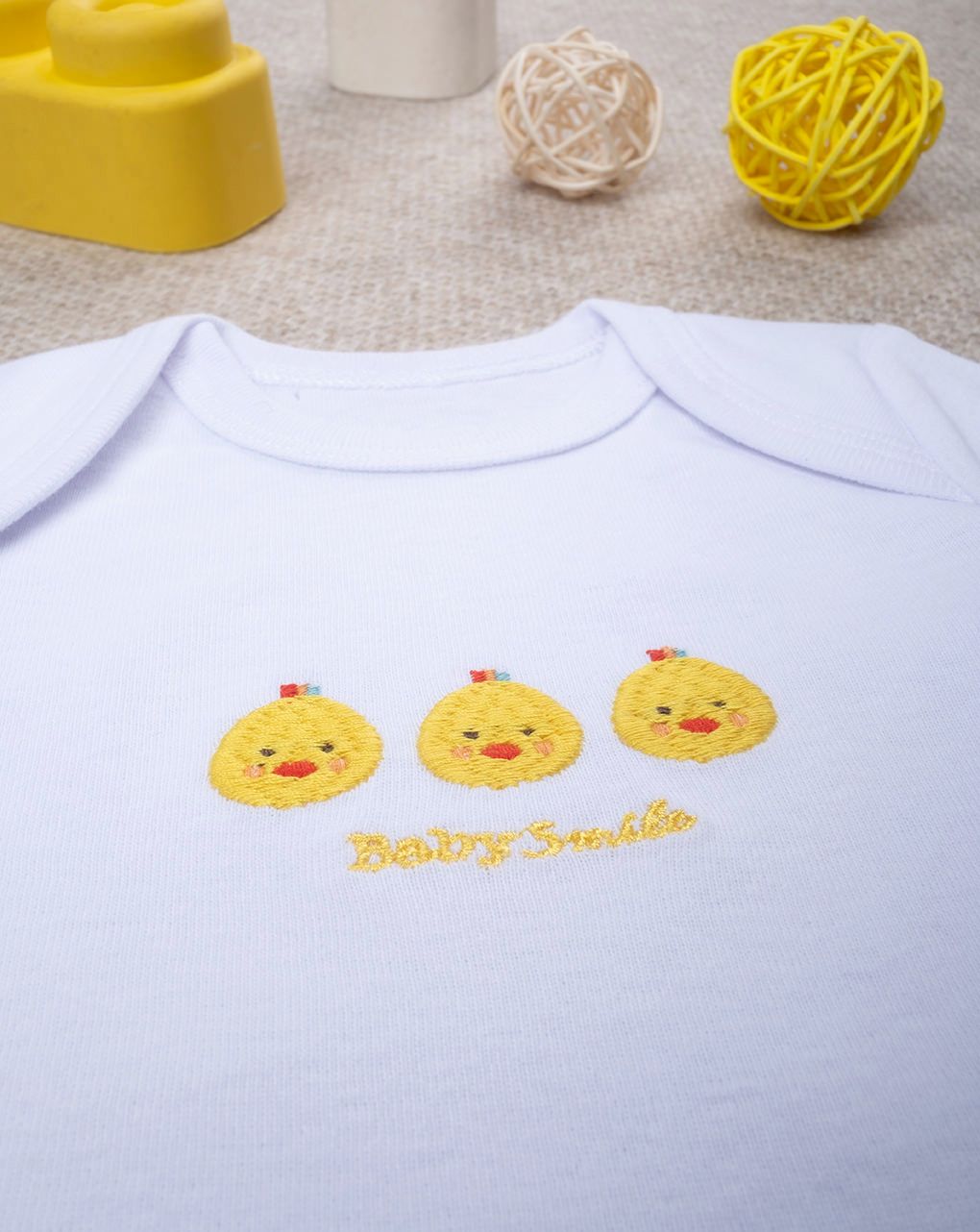 Body unisex smile ricamo paperelle