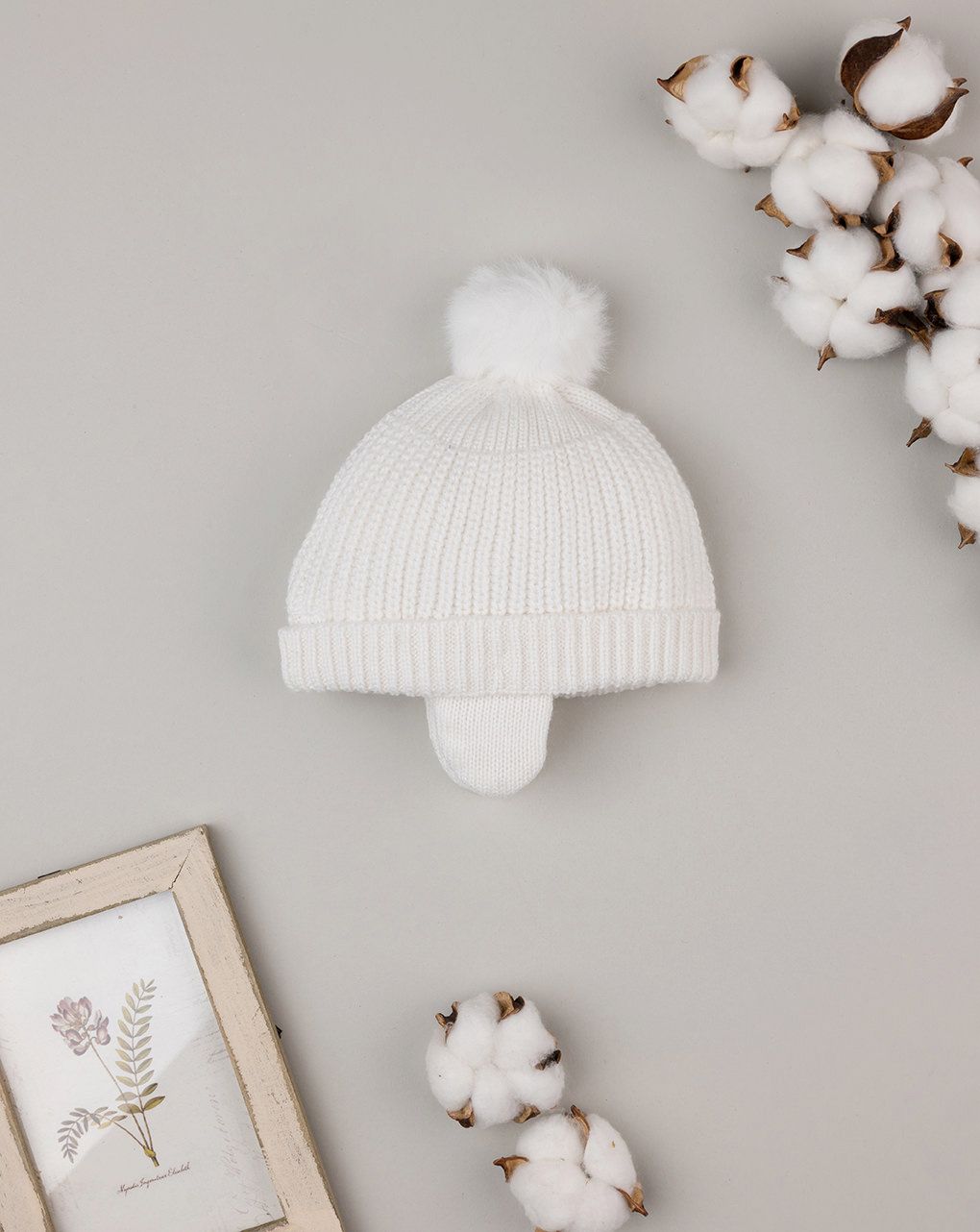 Cappello con pon pon