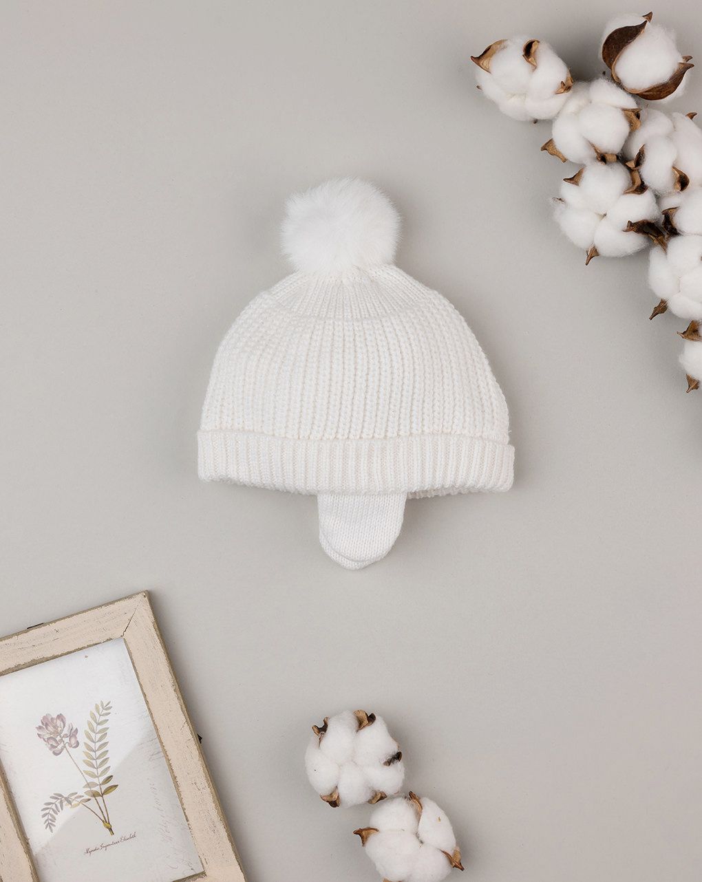 Cappello con pon pon