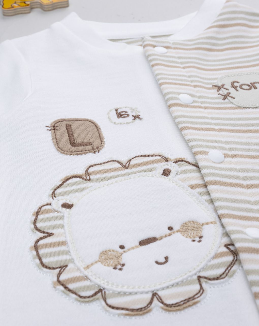 Tutina bimbo bicolor righe/lion