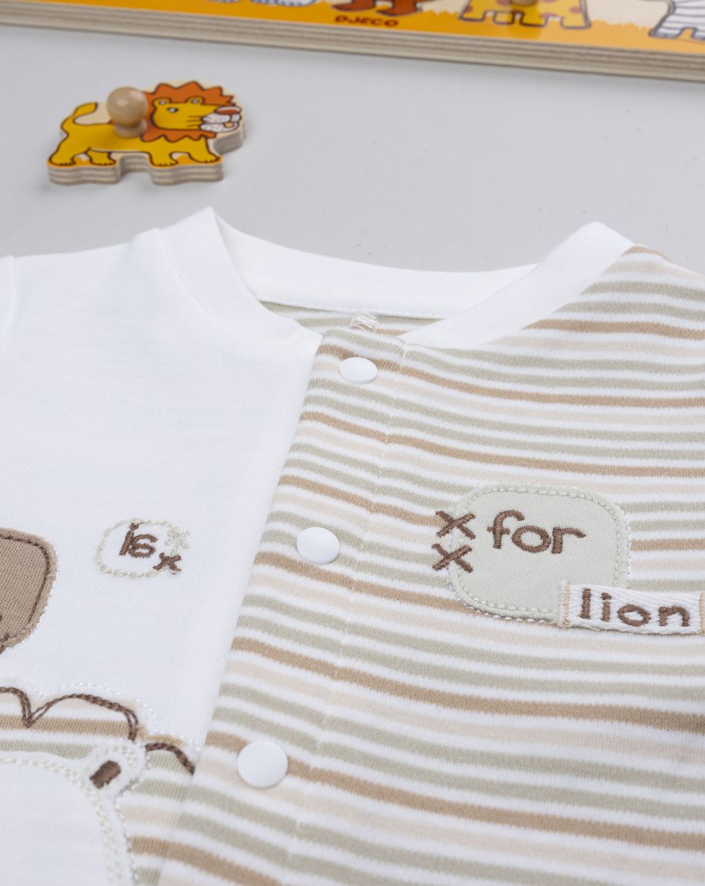 Tutina bimbo bicolor righe/lion