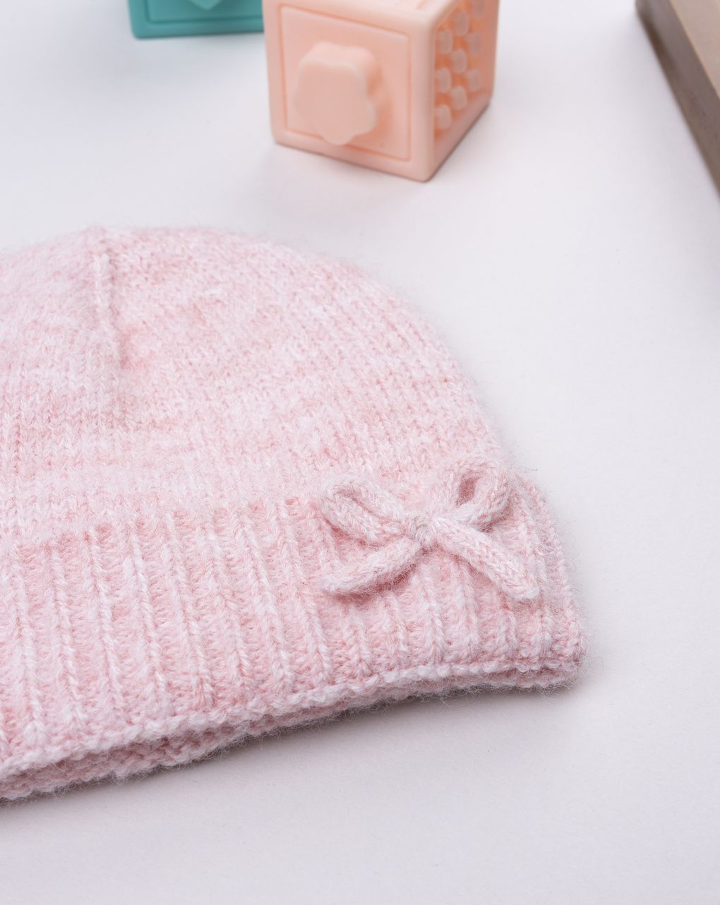 Cappello tricot bimba rosa con fiocchetto