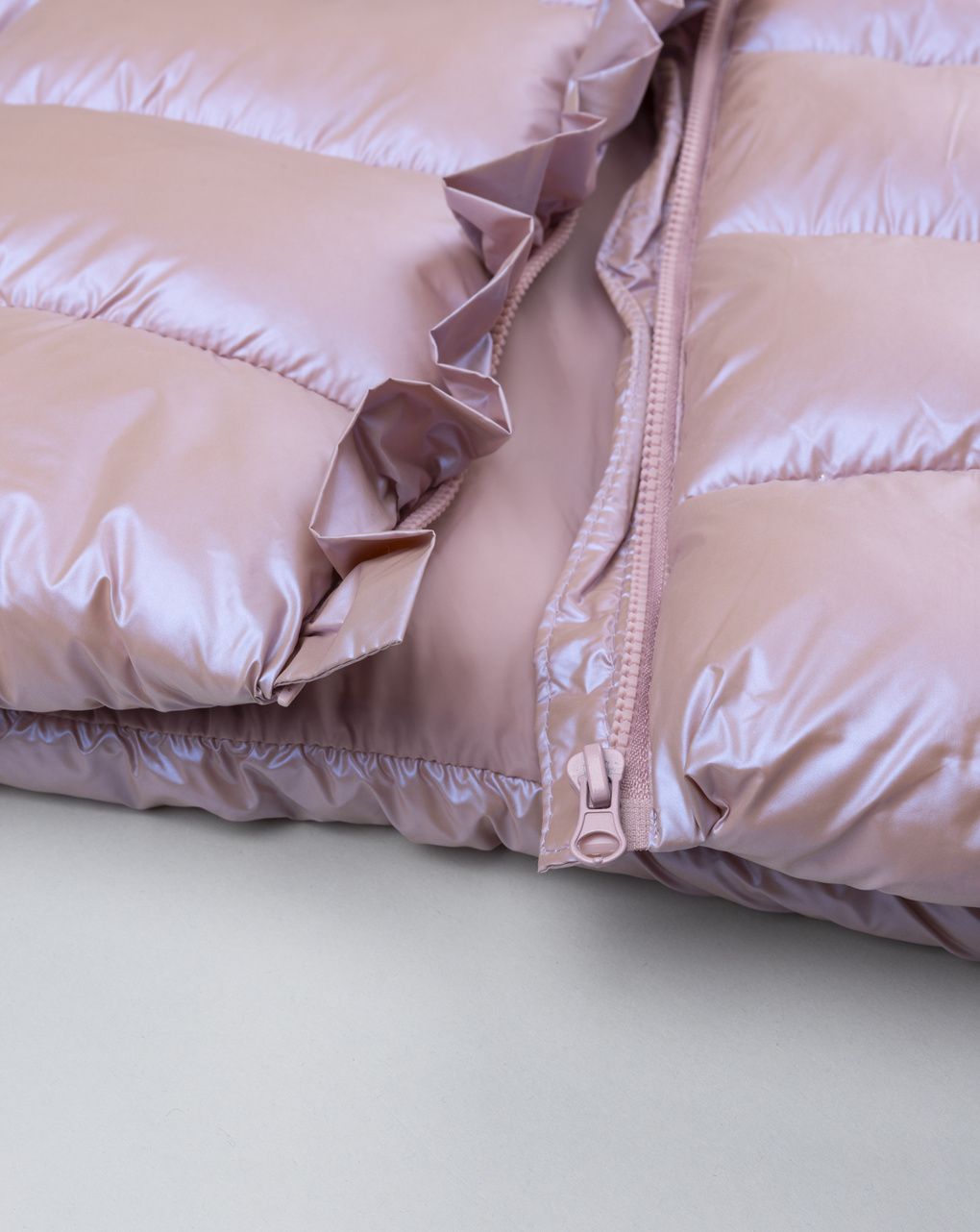 Piumino bimba rosa laminato
