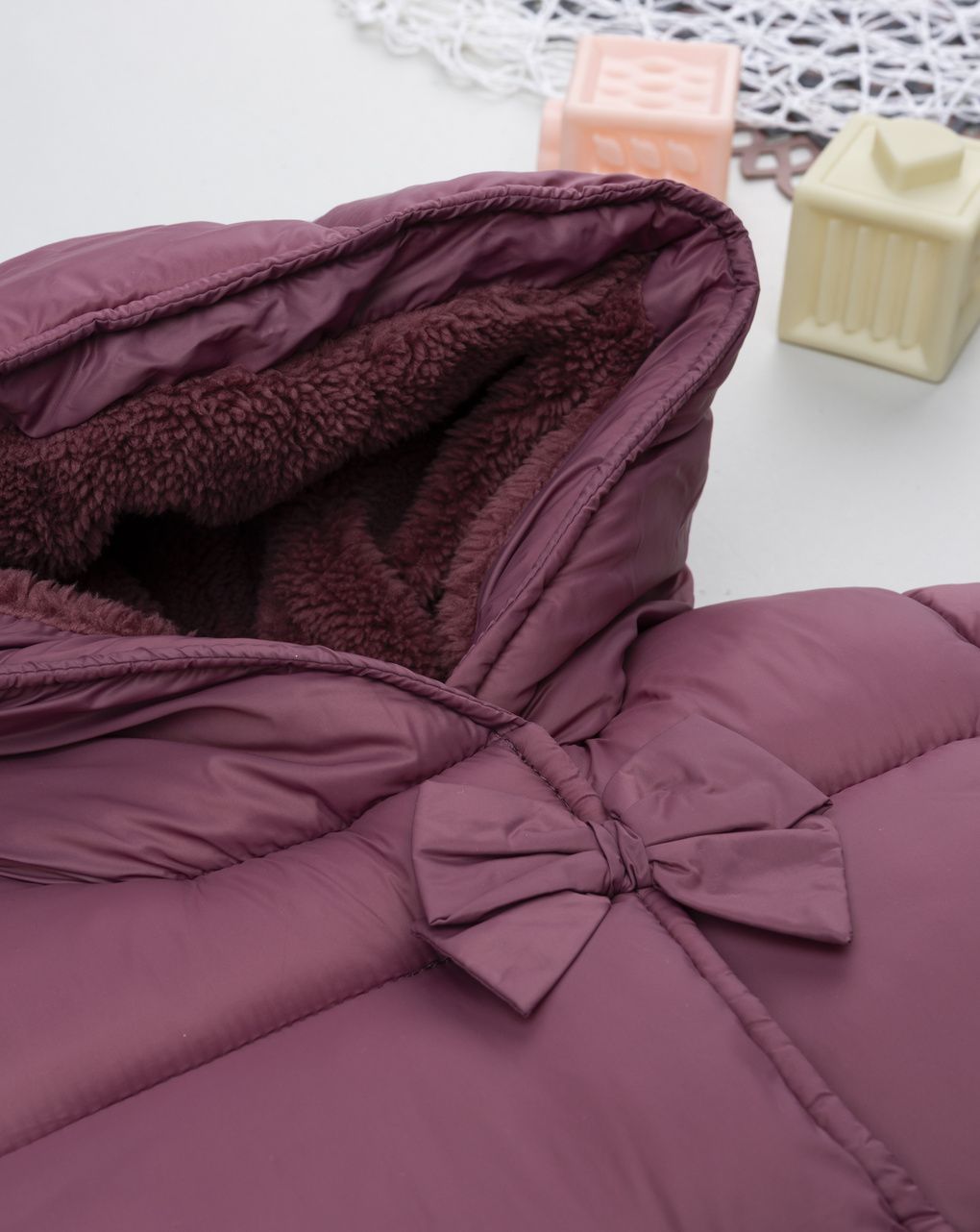 Piumino bimba rosa scuro fiocchi