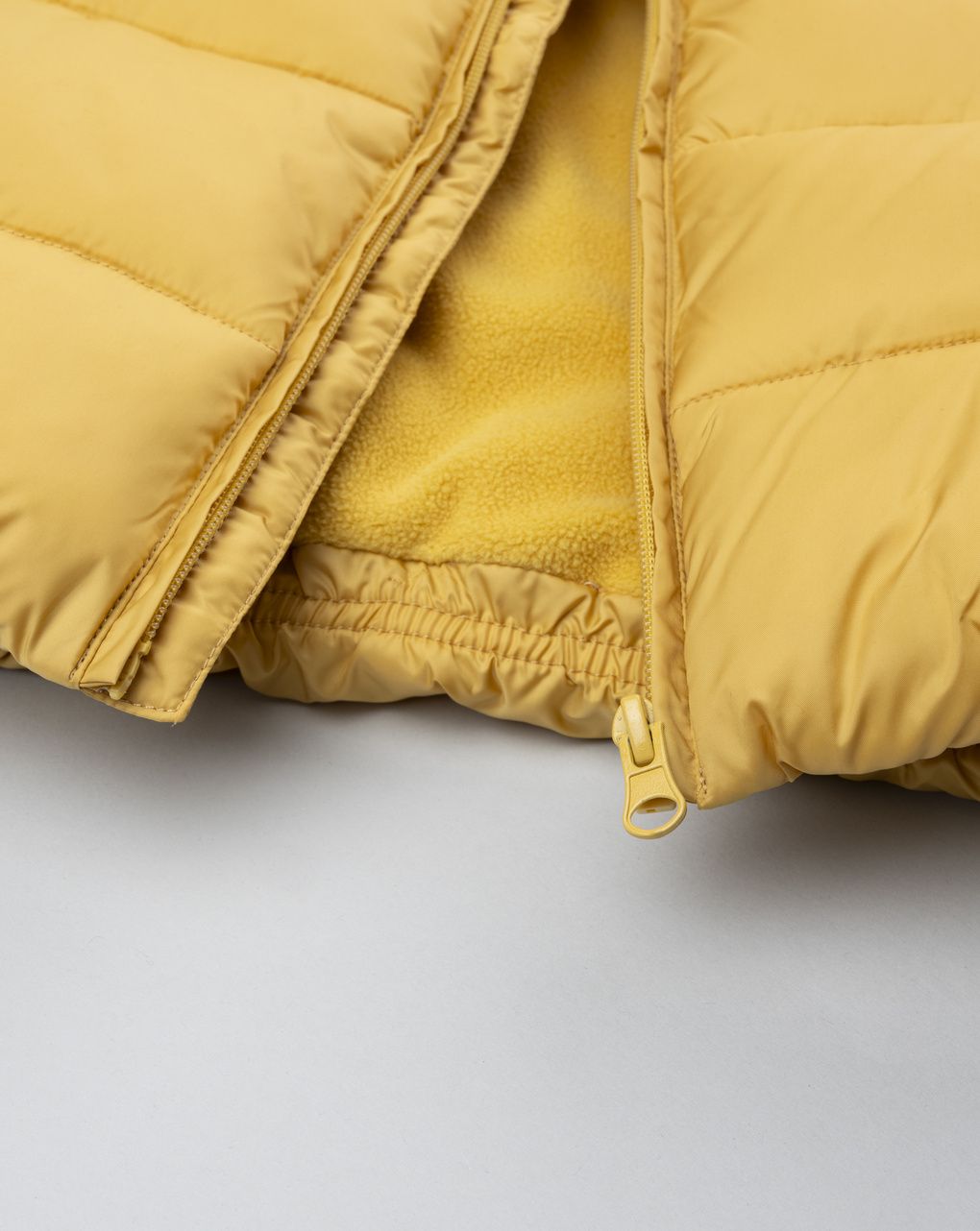 Piumino bimbo giallo pile interno