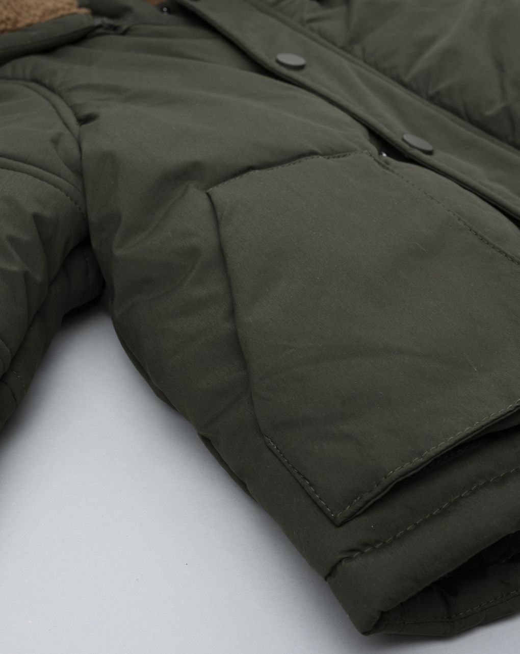 Piumino bimbo verde finto pelo