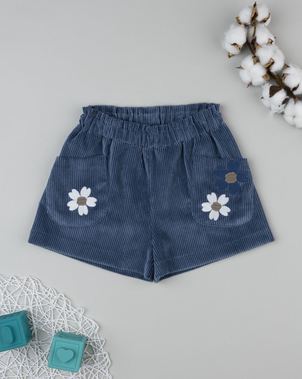 Shorts bimba blu con fiori
