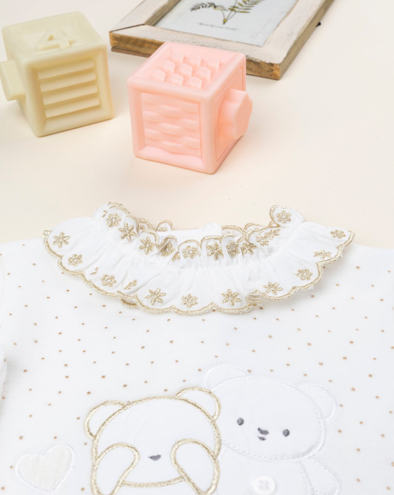 Tutina bimba bianca ricamo oro