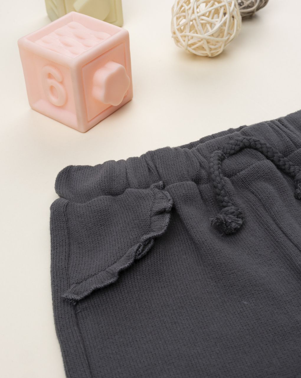 Pantalone bimba grigio maglina tagliata