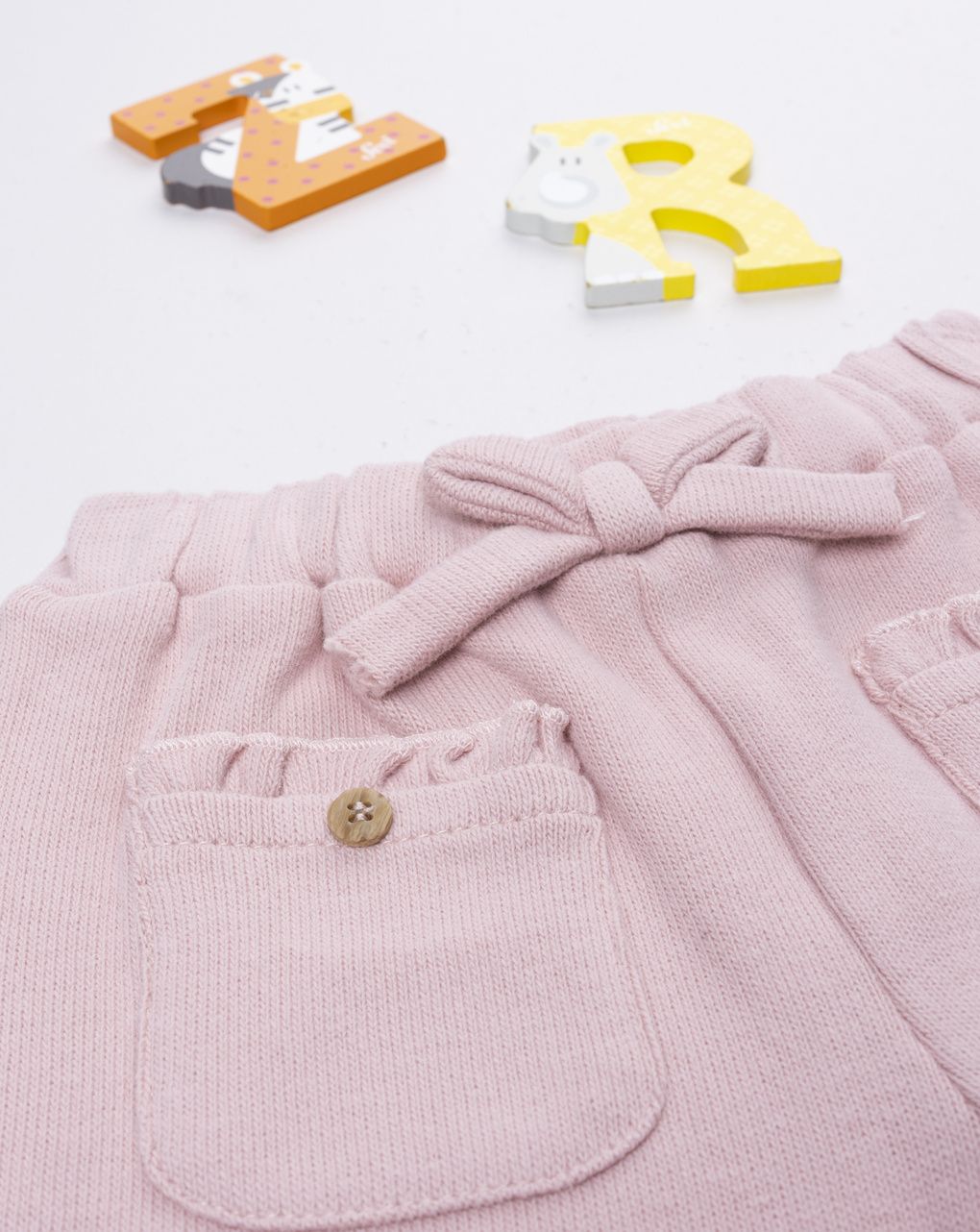 Pantaloni bimba rosa con fiocco