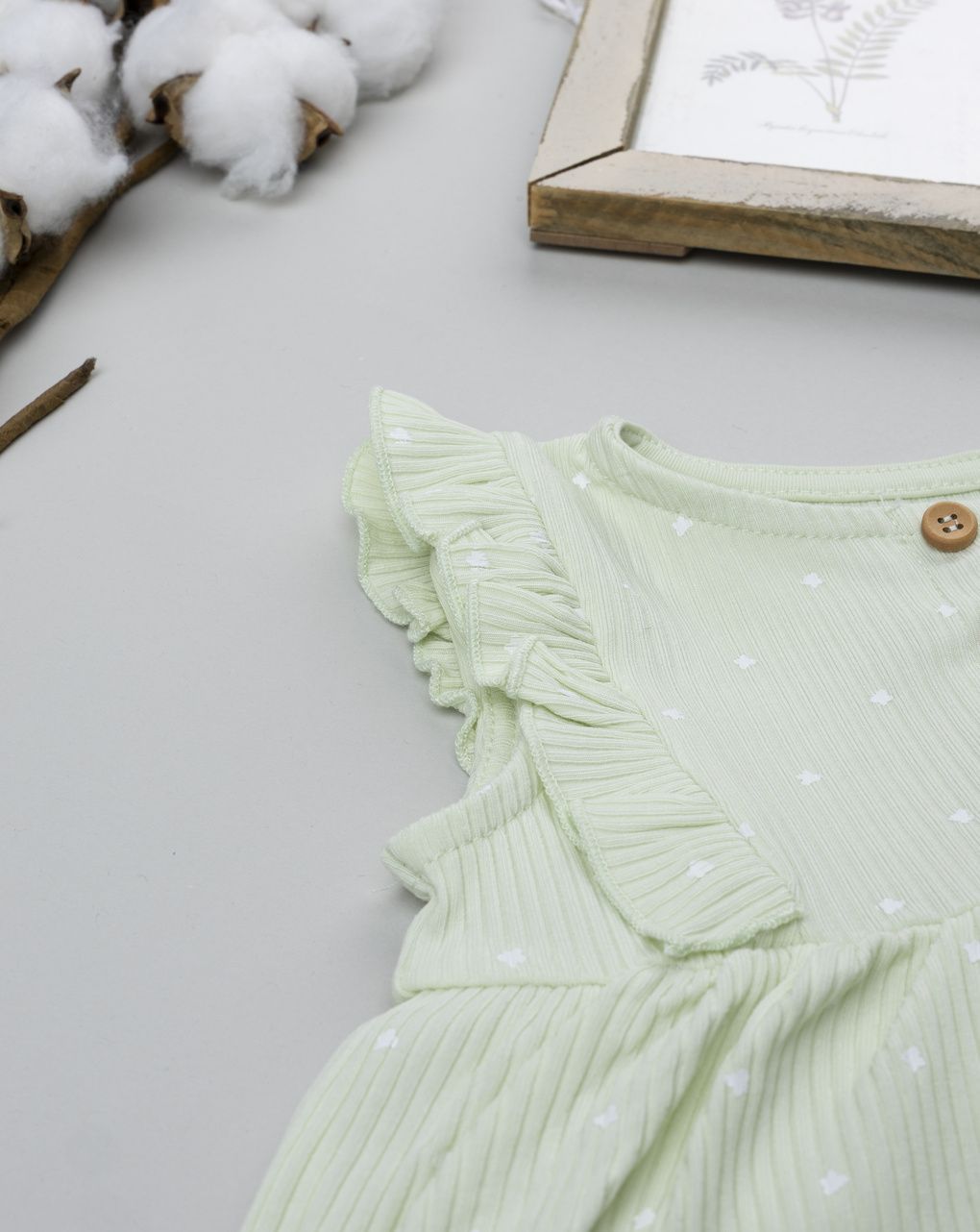 Pagliaccetto neonata verde con frill