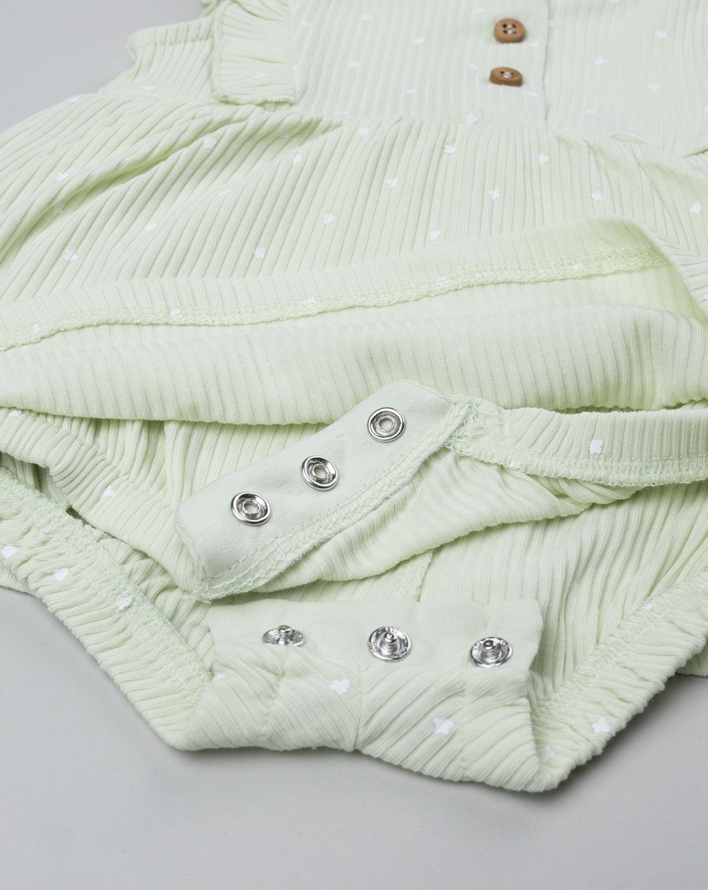 Pagliaccetto neonata verde con frill