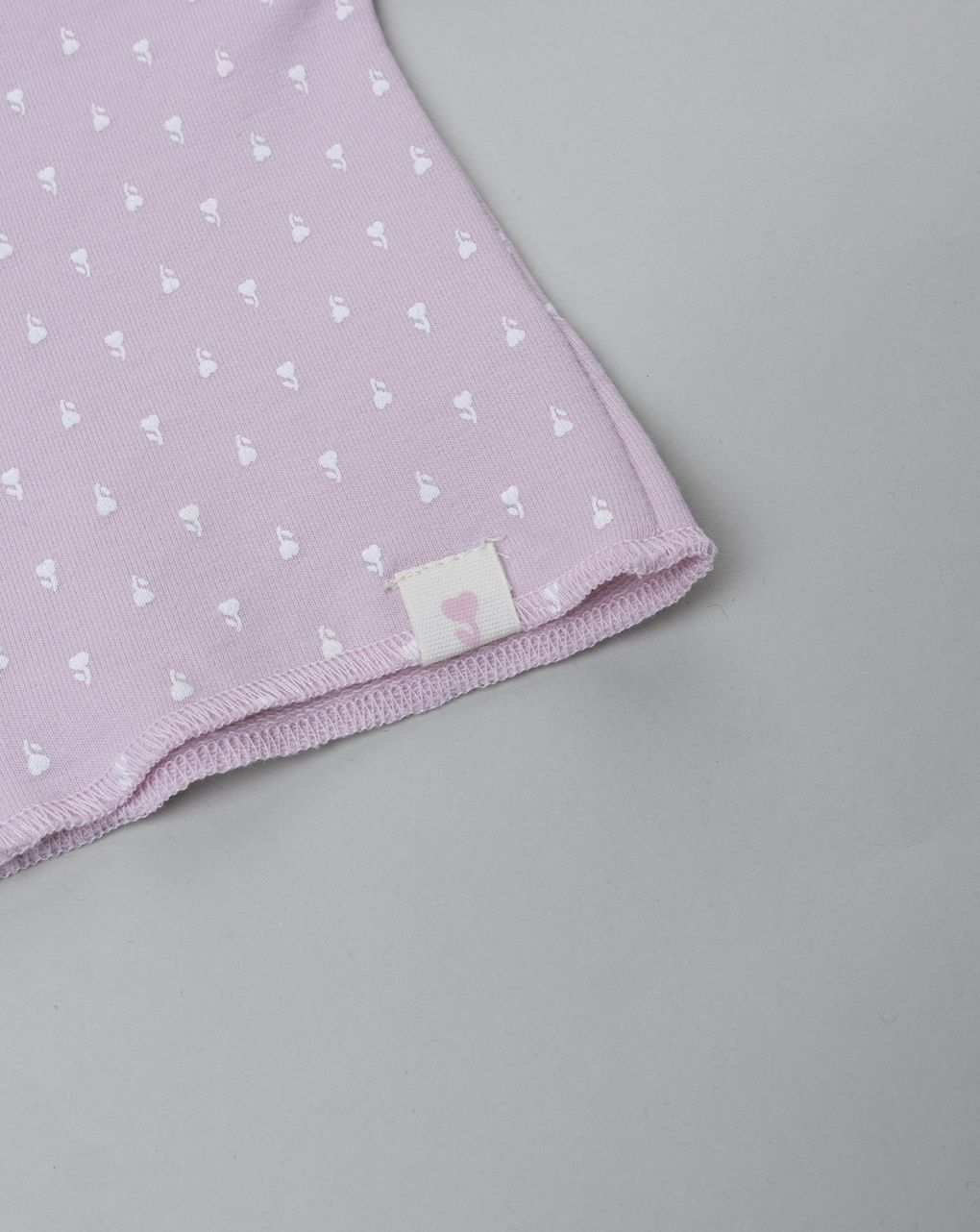 Cardigan neonata rosa con allover