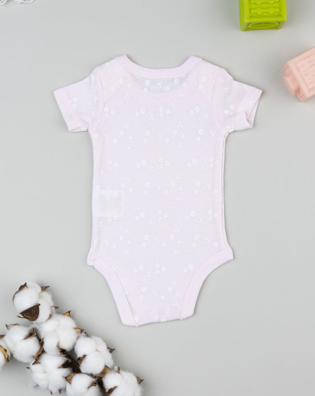 Body costina neonata rosa con fiori