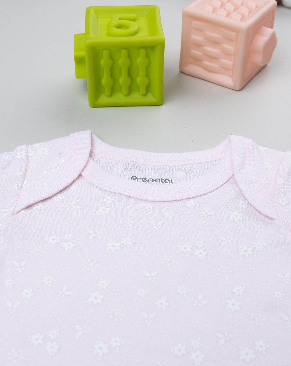 Body costina neonata rosa con fiori